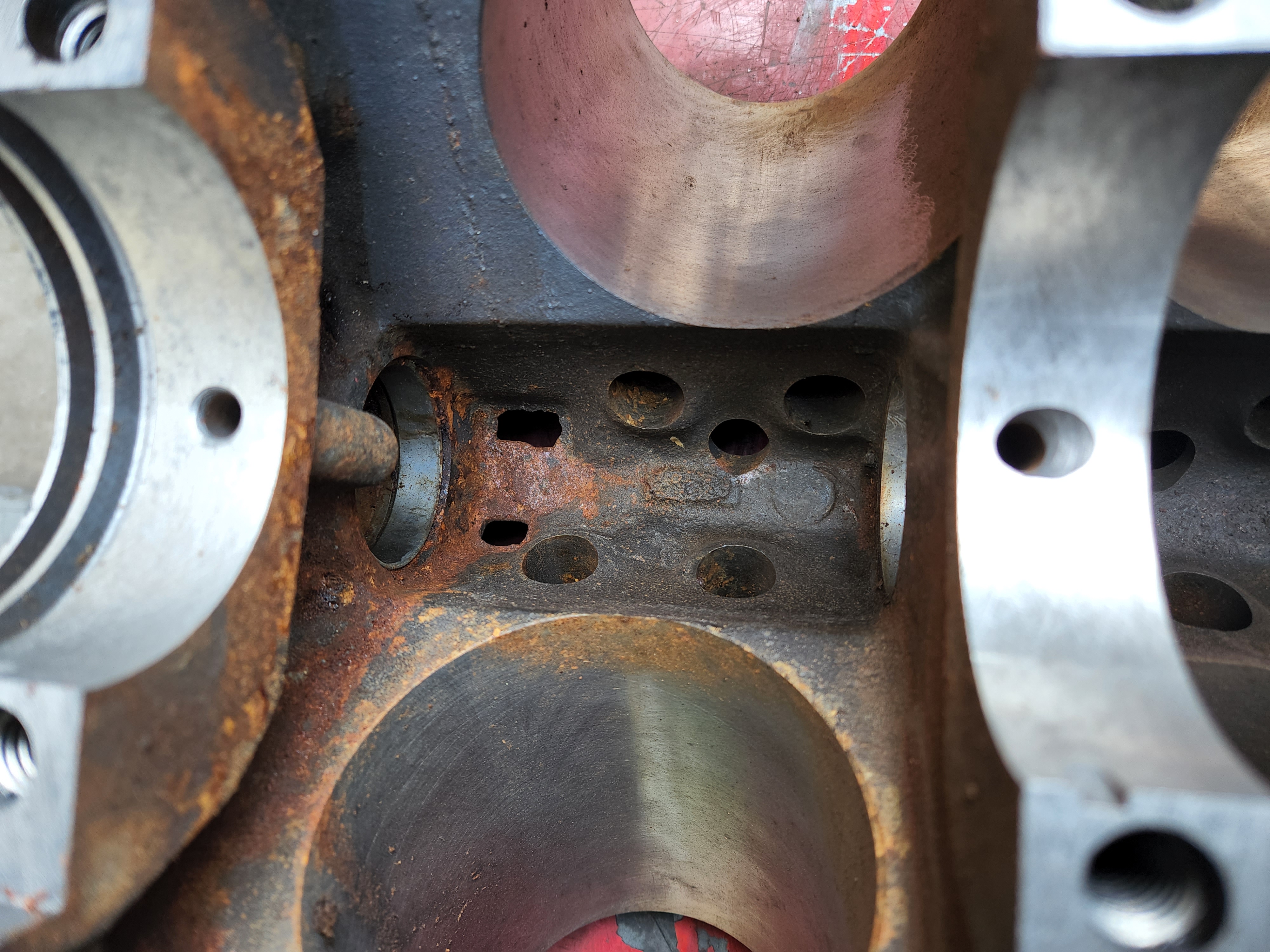 Dustless laser rust removal on 428 Ford engine block.